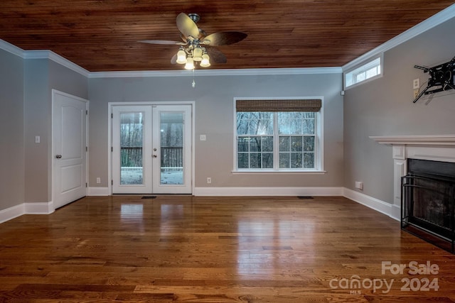 unfurnished living room featuring dark hardwood / wood-style flooring, french doors, wood ceiling, and ornamental molding