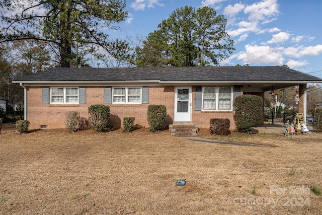 single story home with a carport