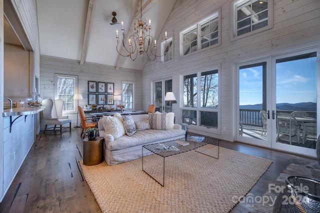 living room featuring beamed ceiling, dark hardwood / wood-style floors, high vaulted ceiling, and wood walls