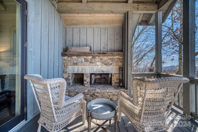 exterior space featuring an outdoor stone fireplace