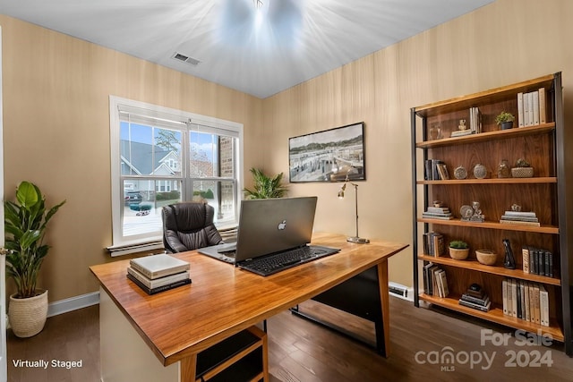 office with dark hardwood / wood-style flooring