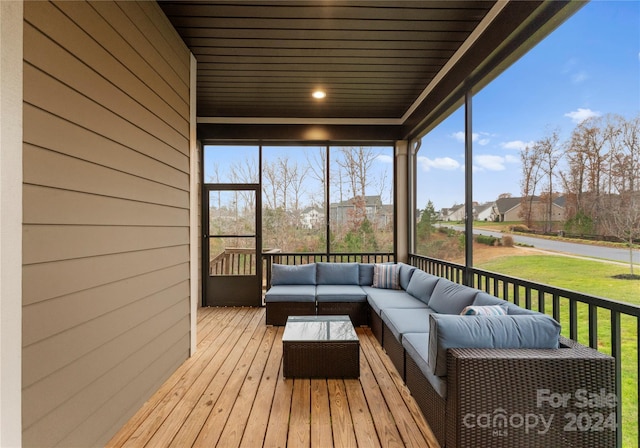 unfurnished sunroom featuring wooden ceiling