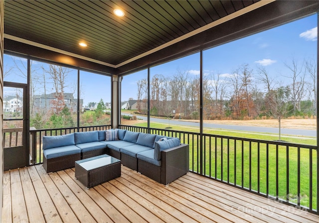 unfurnished sunroom with wooden ceiling