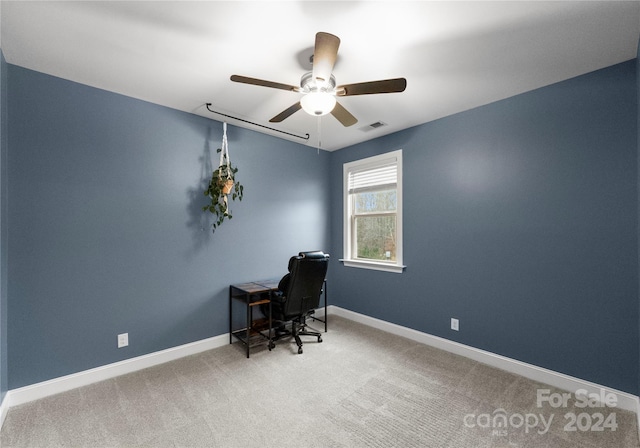 home office with ceiling fan and carpet floors