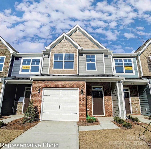 multi unit property featuring a garage