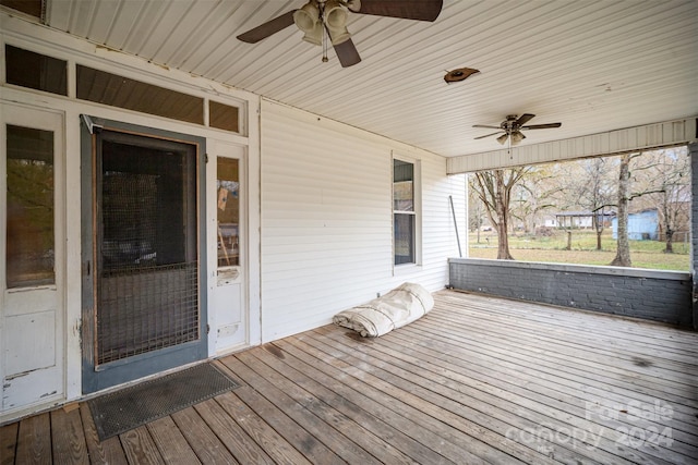 wooden terrace with ceiling fan