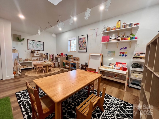 dining room with hardwood / wood-style floors