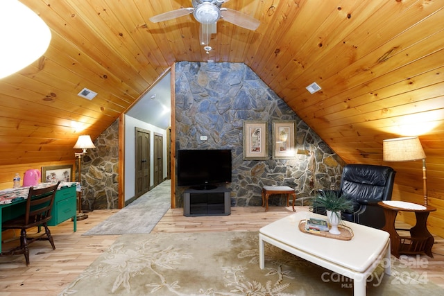 living room with ceiling fan, light wood-type flooring, wooden ceiling, and vaulted ceiling