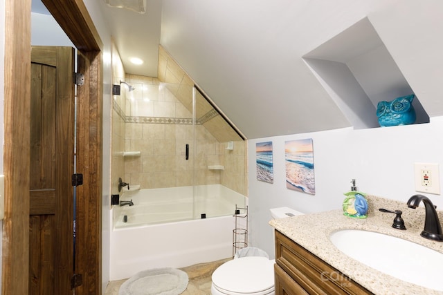 full bathroom with vanity, toilet, and tiled shower / bath