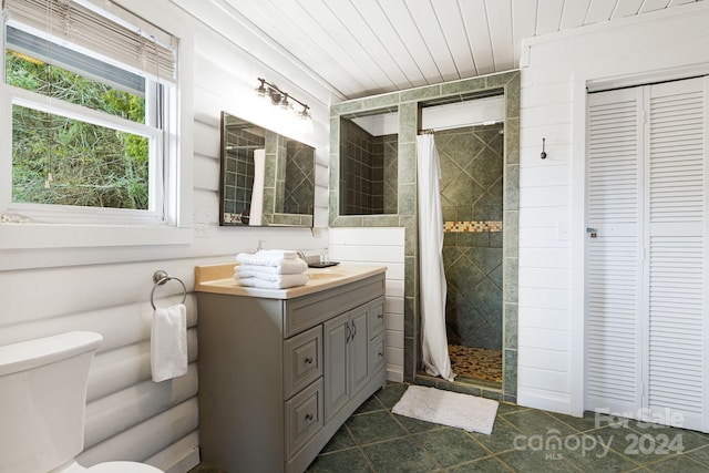 bathroom featuring a shower with shower curtain, vanity, toilet, and wooden ceiling