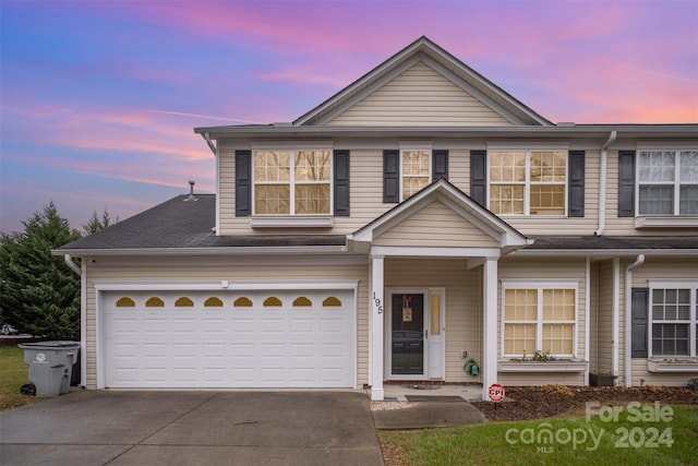 view of front of property featuring a garage