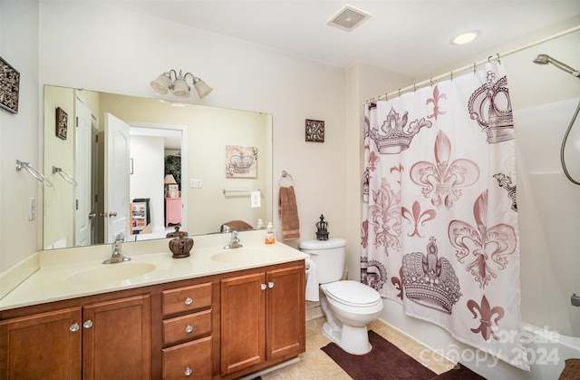 full bathroom with tile patterned floors, vanity, shower / bath combination with curtain, and toilet