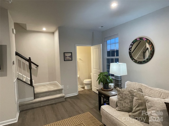 living room featuring dark hardwood / wood-style floors