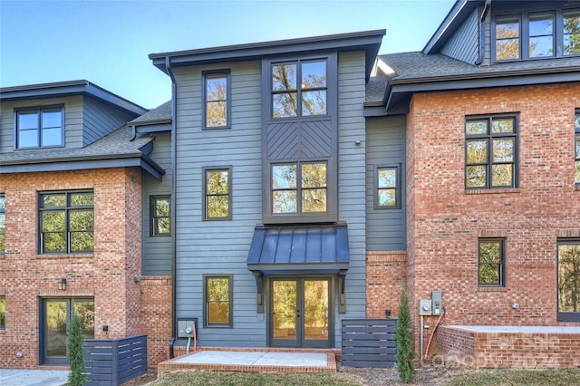 back of house with a patio area