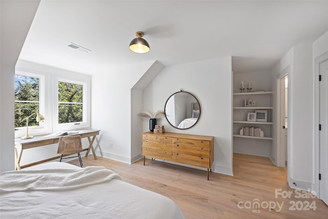 bedroom with light hardwood / wood-style floors