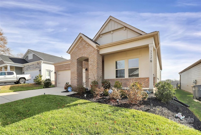 view of front facade with a garage and a front yard