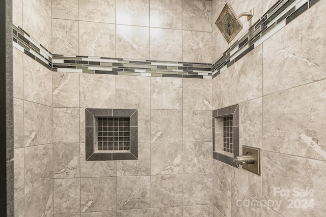 room details with a tile shower