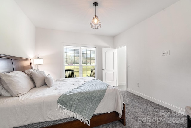 bedroom with dark carpet