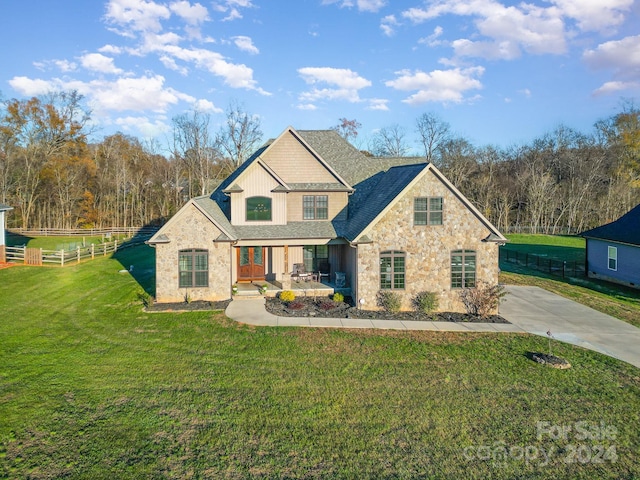 view of front of house with a front lawn