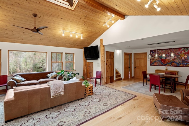 living room featuring wood ceiling, ceiling fan, beam ceiling, high vaulted ceiling, and light hardwood / wood-style flooring