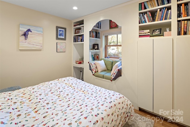 bedroom featuring hardwood / wood-style flooring