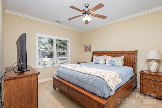 bedroom featuring light carpet, ceiling fan, and ornamental molding