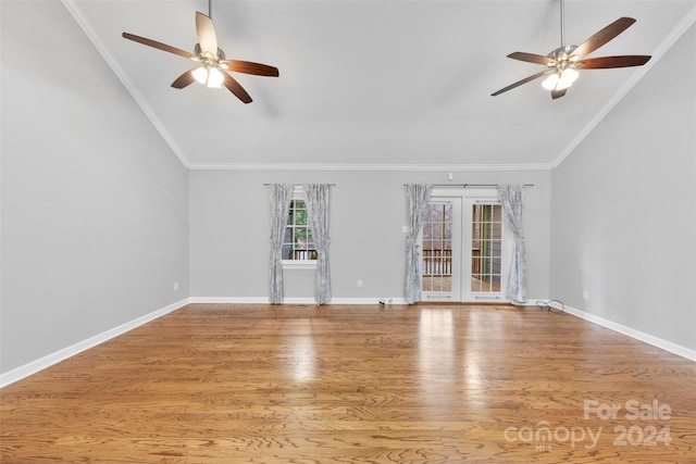 interior space with ceiling fan, hardwood / wood-style floors, and ornamental molding