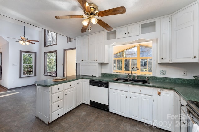 kitchen with kitchen peninsula, stainless steel range, sink, dishwasher, and white cabinetry