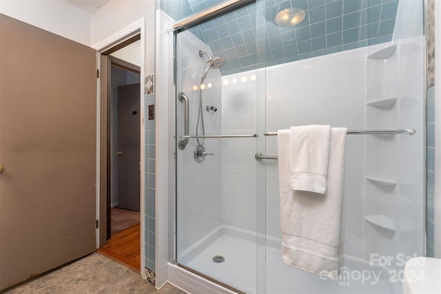 bathroom featuring walk in shower