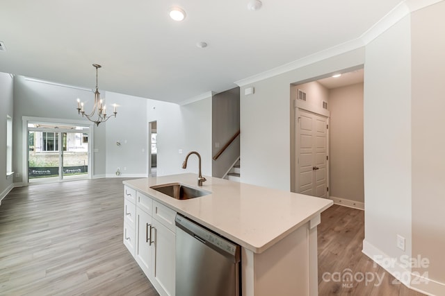 kitchen featuring white cabinetry, sink, stainless steel dishwasher, light hardwood / wood-style floors, and a kitchen island with sink