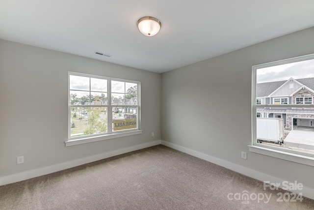 empty room featuring carpet