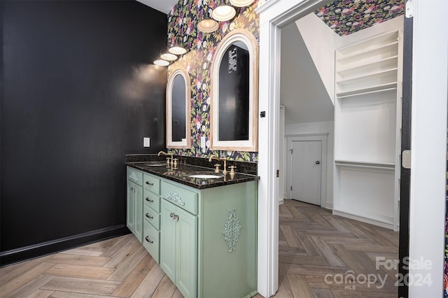 bathroom featuring vanity and parquet floors