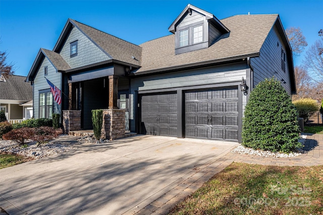 view of front of home with a garage