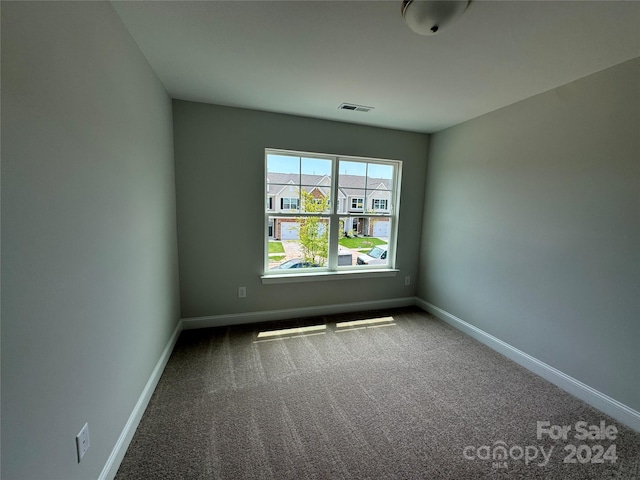 view of carpeted spare room