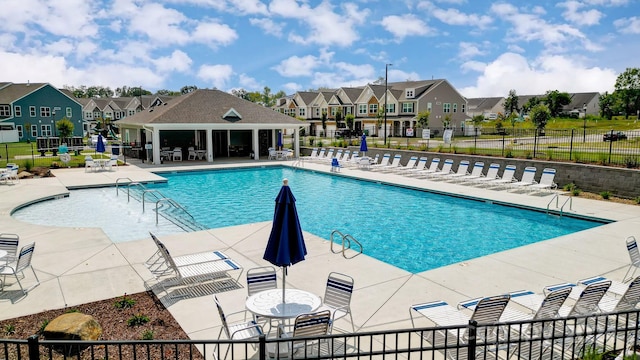 view of pool featuring a patio area