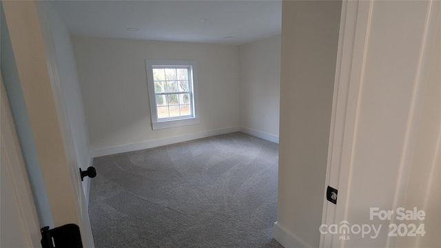 empty room with carpet floors