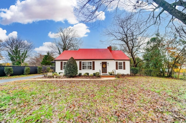 ranch-style home with a front yard