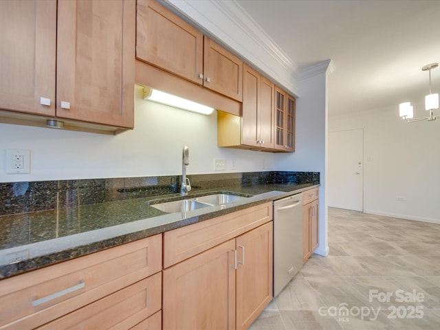 kitchen with glass insert cabinets, hanging light fixtures, a sink, crown molding, and stainless steel dishwasher