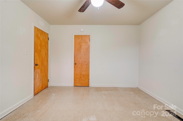 unfurnished room featuring ceiling fan