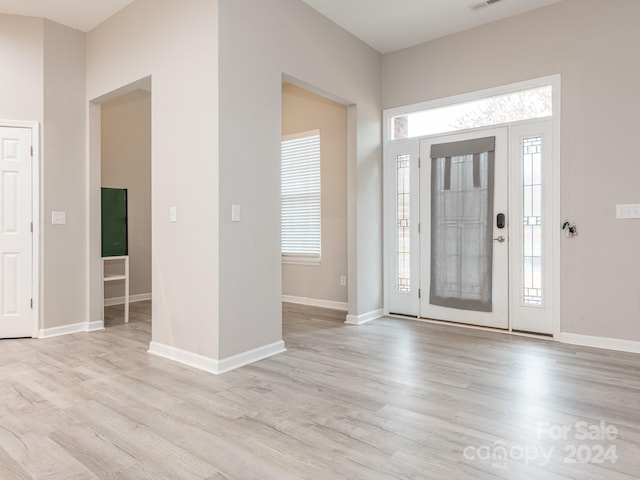 entrance foyer featuring light hardwood / wood-style flooring