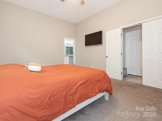 bedroom with carpet flooring, ceiling fan, and a closet