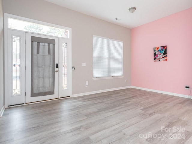 foyer entrance featuring light hardwood / wood-style floors