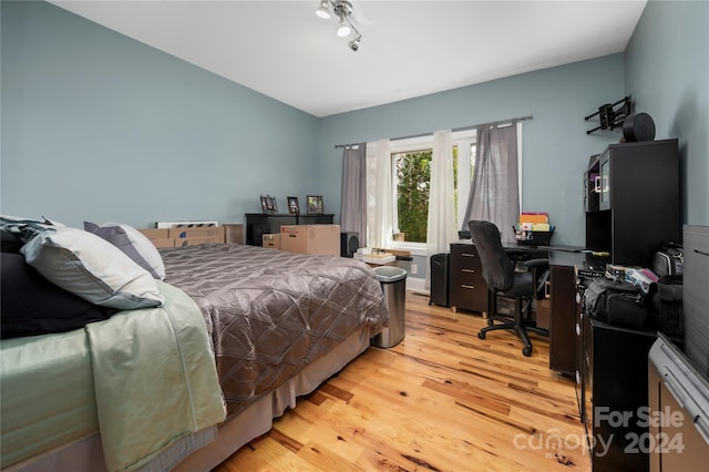 bedroom featuring light hardwood / wood-style floors