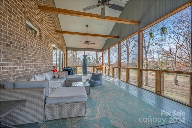 sunroom / solarium with vaulted ceiling with beams and ceiling fan