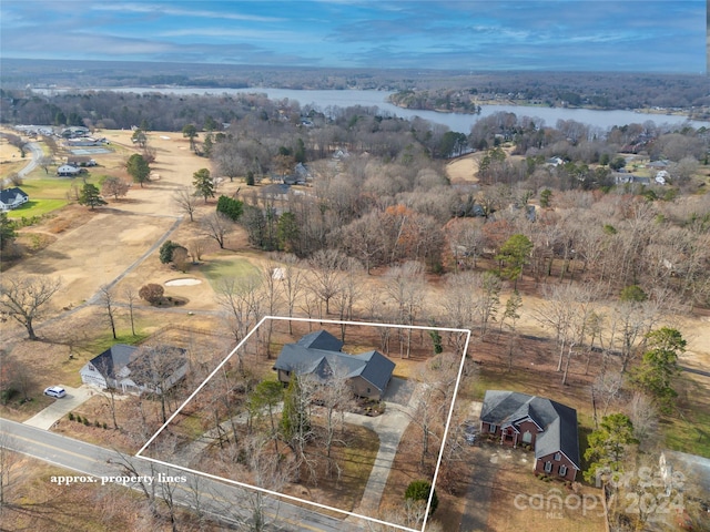 bird's eye view featuring a water view and a rural view