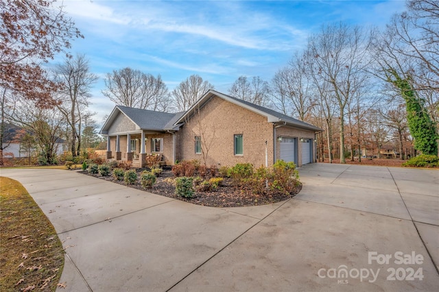 view of side of property featuring a garage