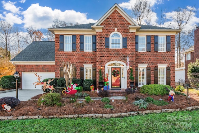 colonial-style house with a garage