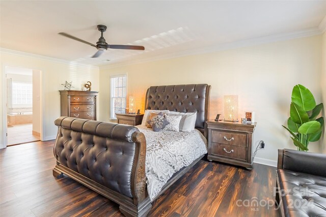 bedroom with ceiling fan, ornamental molding, dark wood-type flooring, and connected bathroom