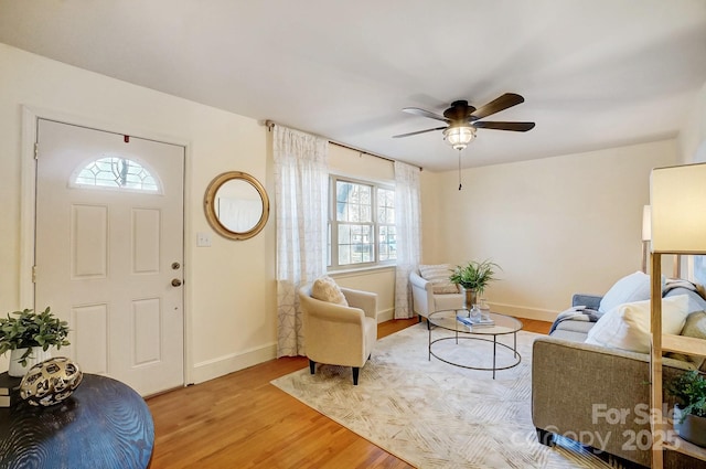 foyer featuring hardwood / wood-style floors and ceiling fan