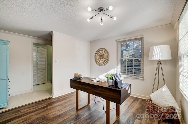 office area with dark hardwood / wood-style flooring, ornamental molding, a textured ceiling, and an inviting chandelier